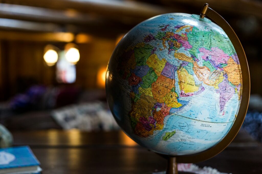 World globe representing travel businesses and destinations; illustrative stock photograph by Kyle Glenn